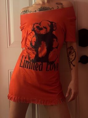 Asymmetrical Orange Off-Shoulder Dress with Teddy Graphic